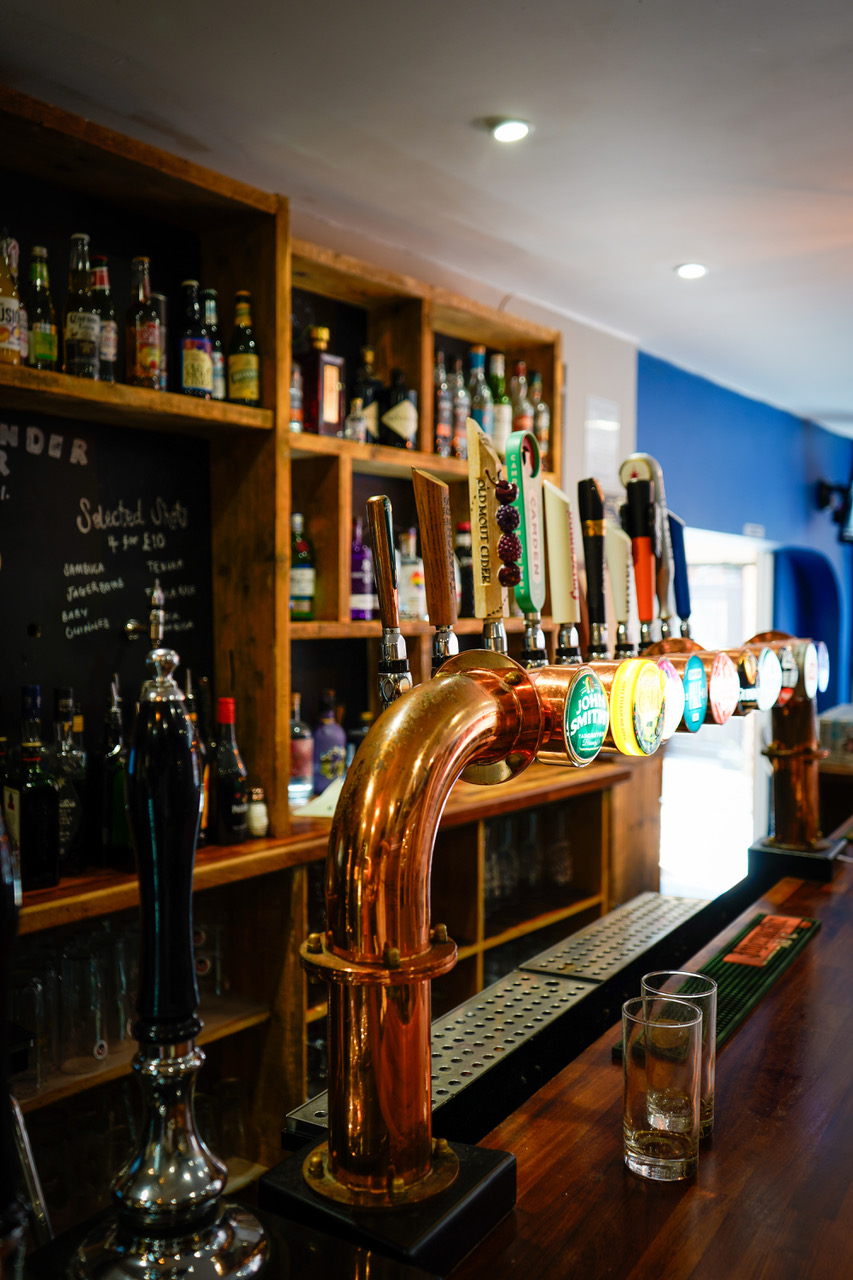 Copper tap tower along the bar