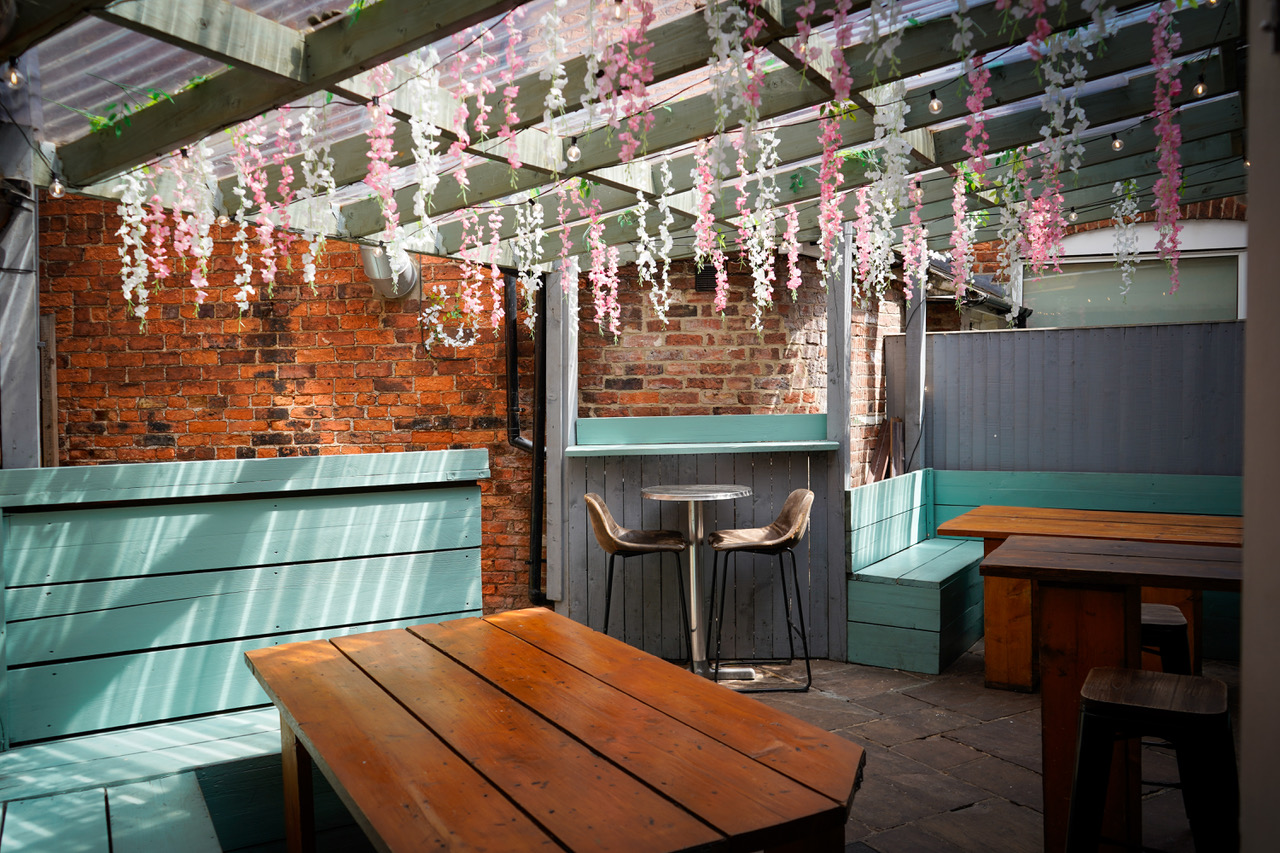 The covered beer courtyard with festoon lights